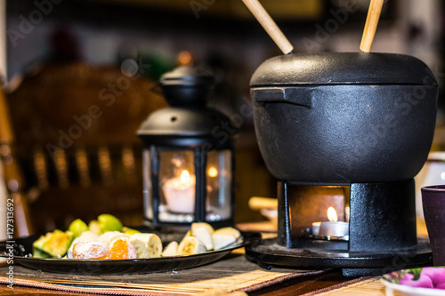 fondue with fruits with candles