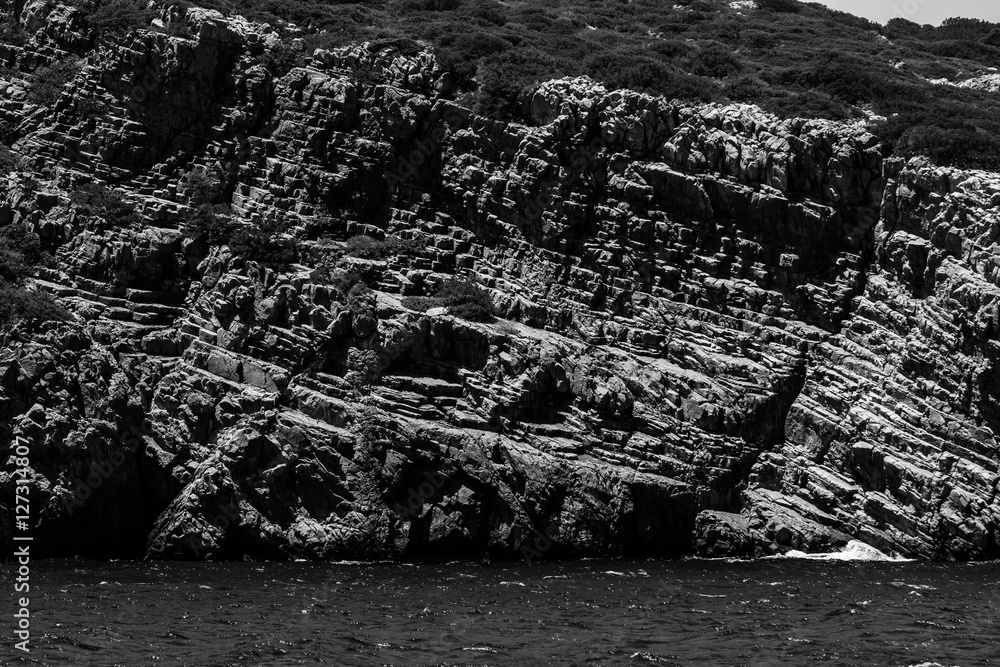 Mediterranean Sea. Crete. Greece. The cliffs of the peninsula of Kalydon. Black and white.