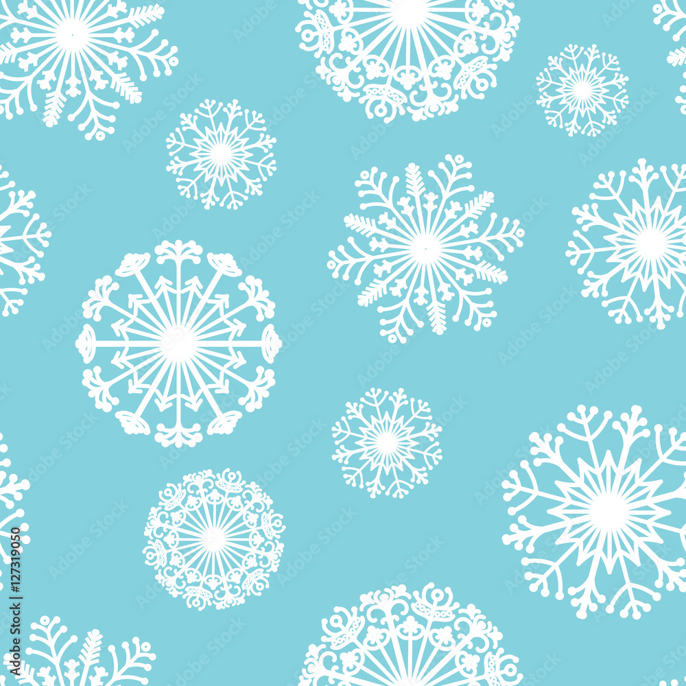 Seamless vector pattern of decorative snowflakes. Stylized Mandala. Winter.