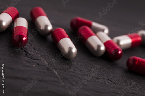 Set of capsules on white background