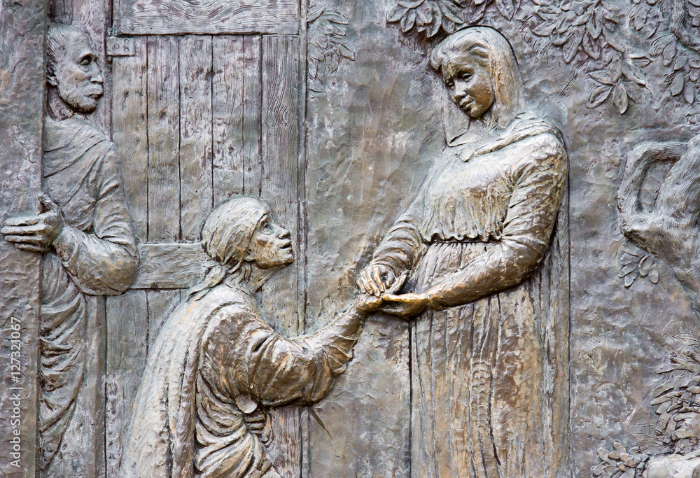 Medjugorje, Bosnia and Herzegovina, 2016/11/12. Bronze relief representing the visitation of Saint Elizabeth by Virgin Mary. 