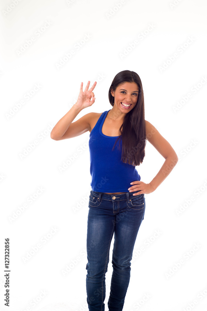 young attractive hispanic woman in casual top and jeans smiling happy and cheerful giving thumb up young attractive hispanic woman in casual top and jeans smiling happy and cheerful giving thumb up