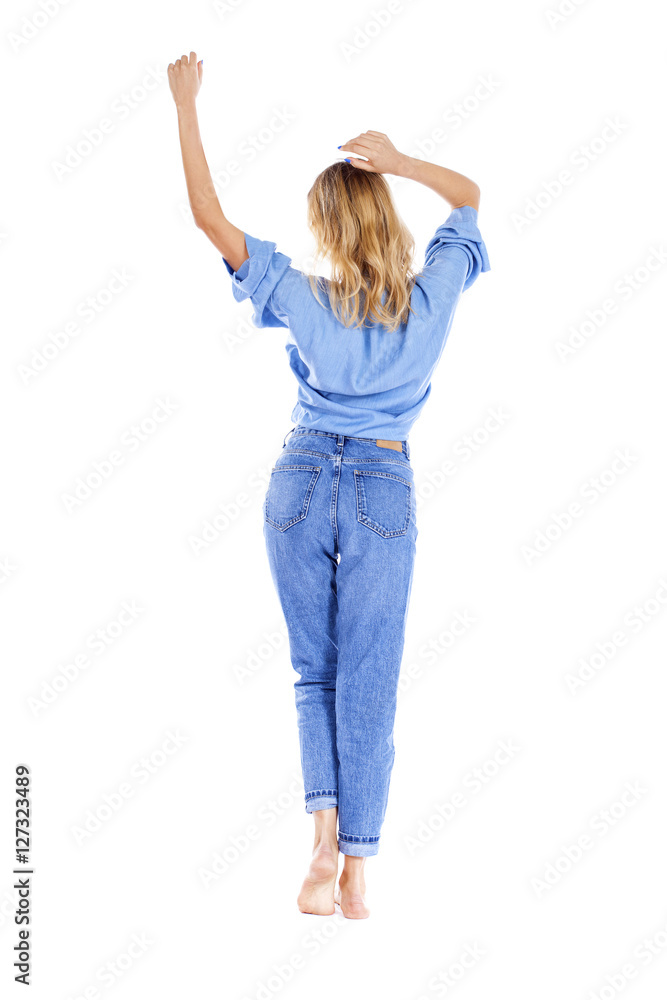 Young beautiful blonde woman in blue jeans Young beautiful blonde woman in blue jeans