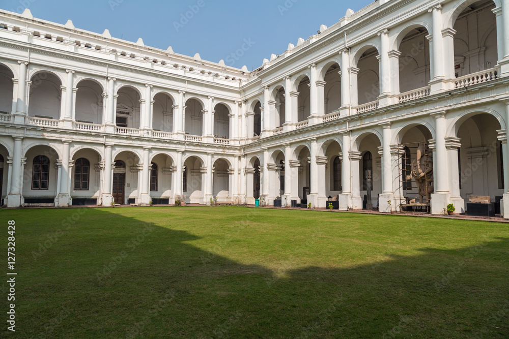Historic Indian museum gothic architectural building at Kolkata, India inner compound as viewed from the ground floor.