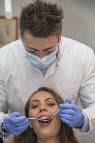 Young woman at the dentist  view from above