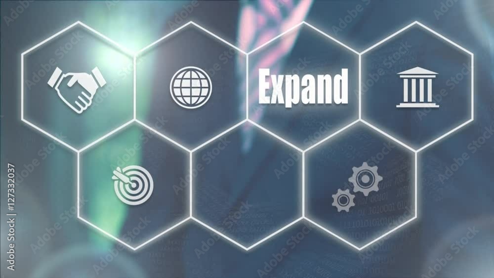 Businessman pressing a Business Expand concept Businessman pressing a Business Expand concept