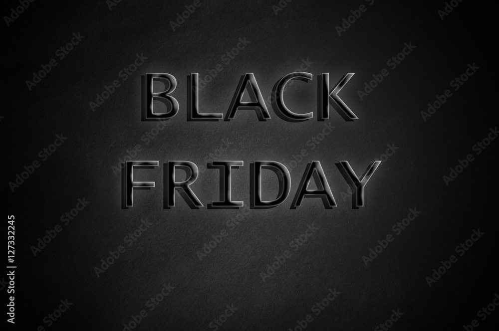 Fototapeta premium Black Friday on dark paper background