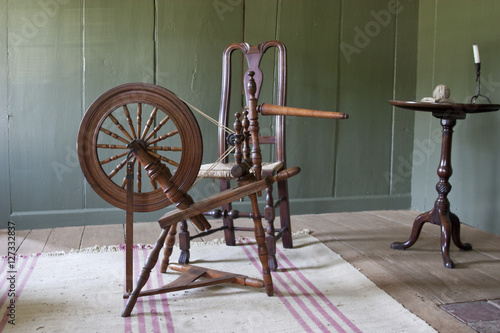 Old Fort Western, old wooden fort located in Augusta, Maine and built in 1754.  It is America's old surviving wooden fort.  Old spinning wheel.