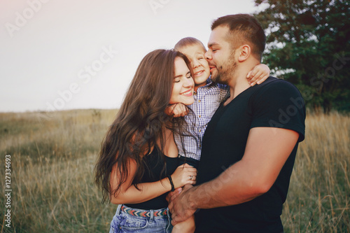young family with a child have fun outdoors