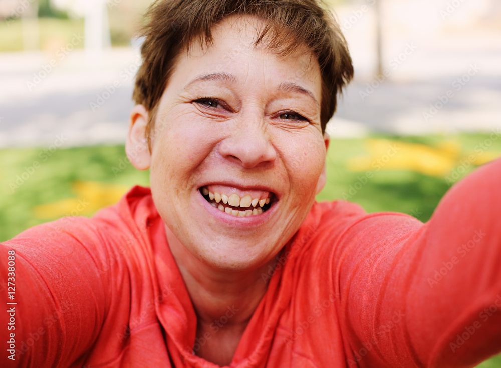 Portrait of beautiful 45 years old woman outdoors Portrait of beautiful 45 years old woman outdoors