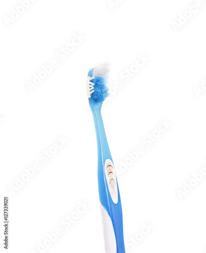 used toothbrush on white background