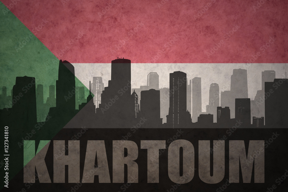 abstract silhouette of the city with text Khartoum at the vintage sudanese flag