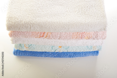 stack of towels on a white background