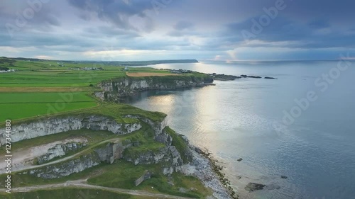Wallpaper Mural Aerial landscape view of the sea and the cliff in Carrick-a-Rede Rope Bridge tourist destination in North Ireland in Ireland Torontodigital.ca