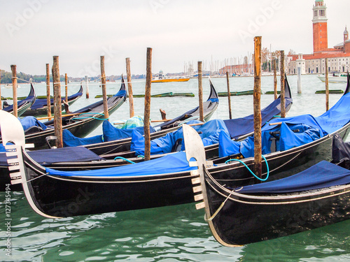 parked gondolas at venice, Italy