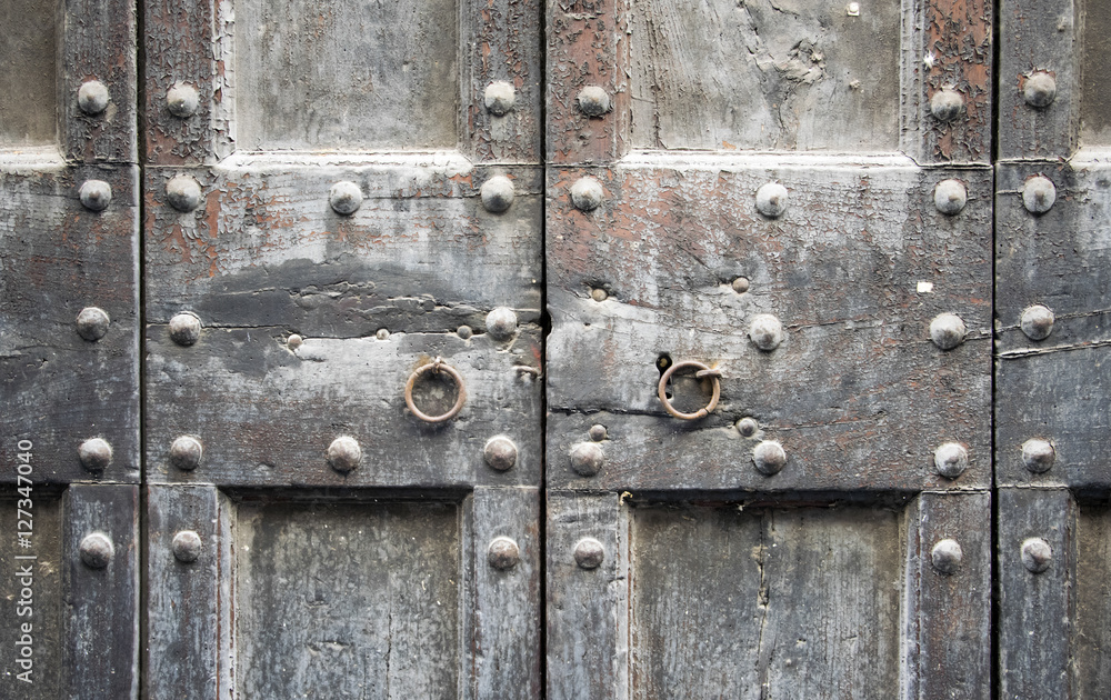 Details of an ancient Italian door in Florence, Italy