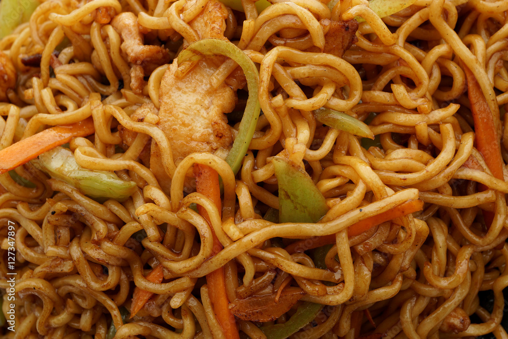 Chinese food. Noodles with pork and vegetables