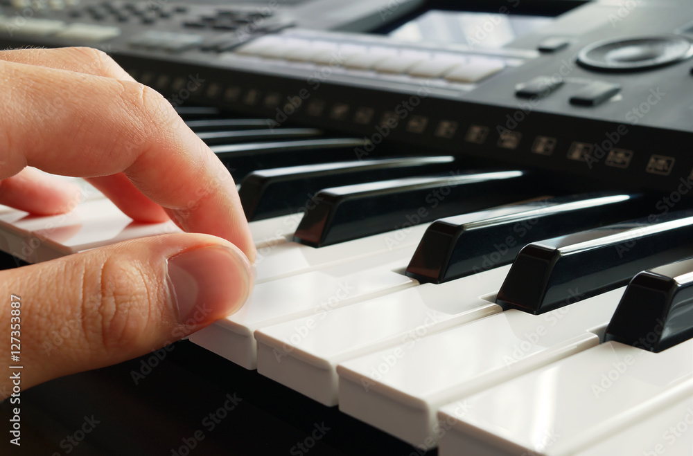 Fototapeta premium Playing piano close up