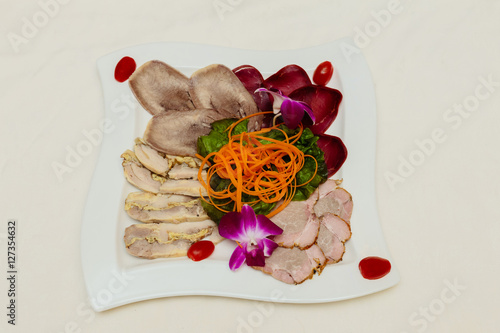 Food on a plate restaurant meat fish white background photo