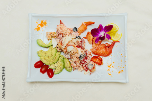 Food on a plate restaurant meat fish white background photo