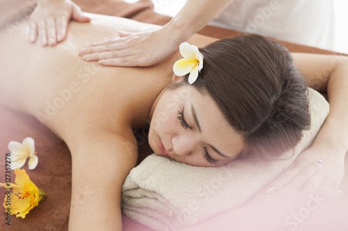 Asian women are receiving back massage