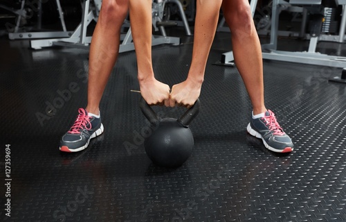 Hands with dumbbell