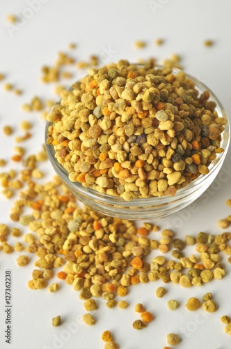 Bee Pollen granules in a glass bowl