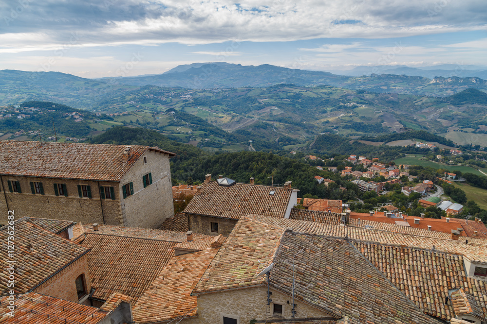 The State of San Marino in Italy, tiled roofs and green hills