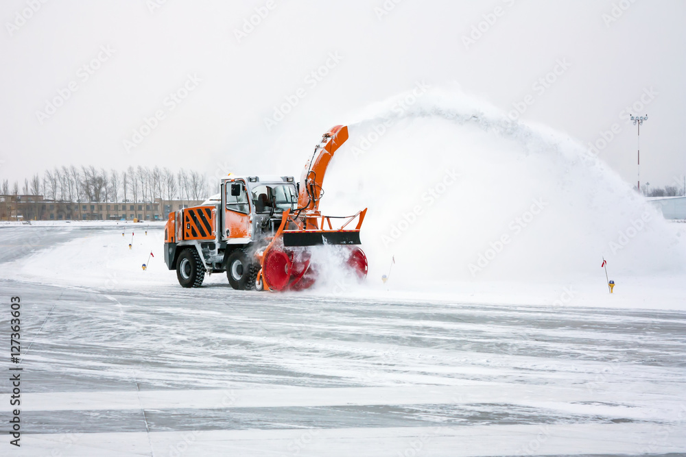 Snow blower cleans taxiway Snow blower cleans taxiway
