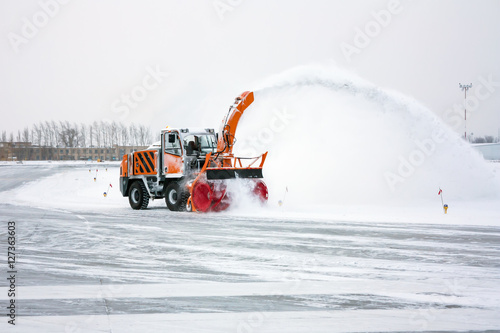 Snow blower cleans taxiway