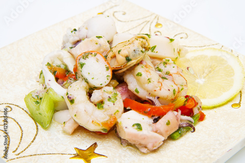 seafood salad on decorated dish photo