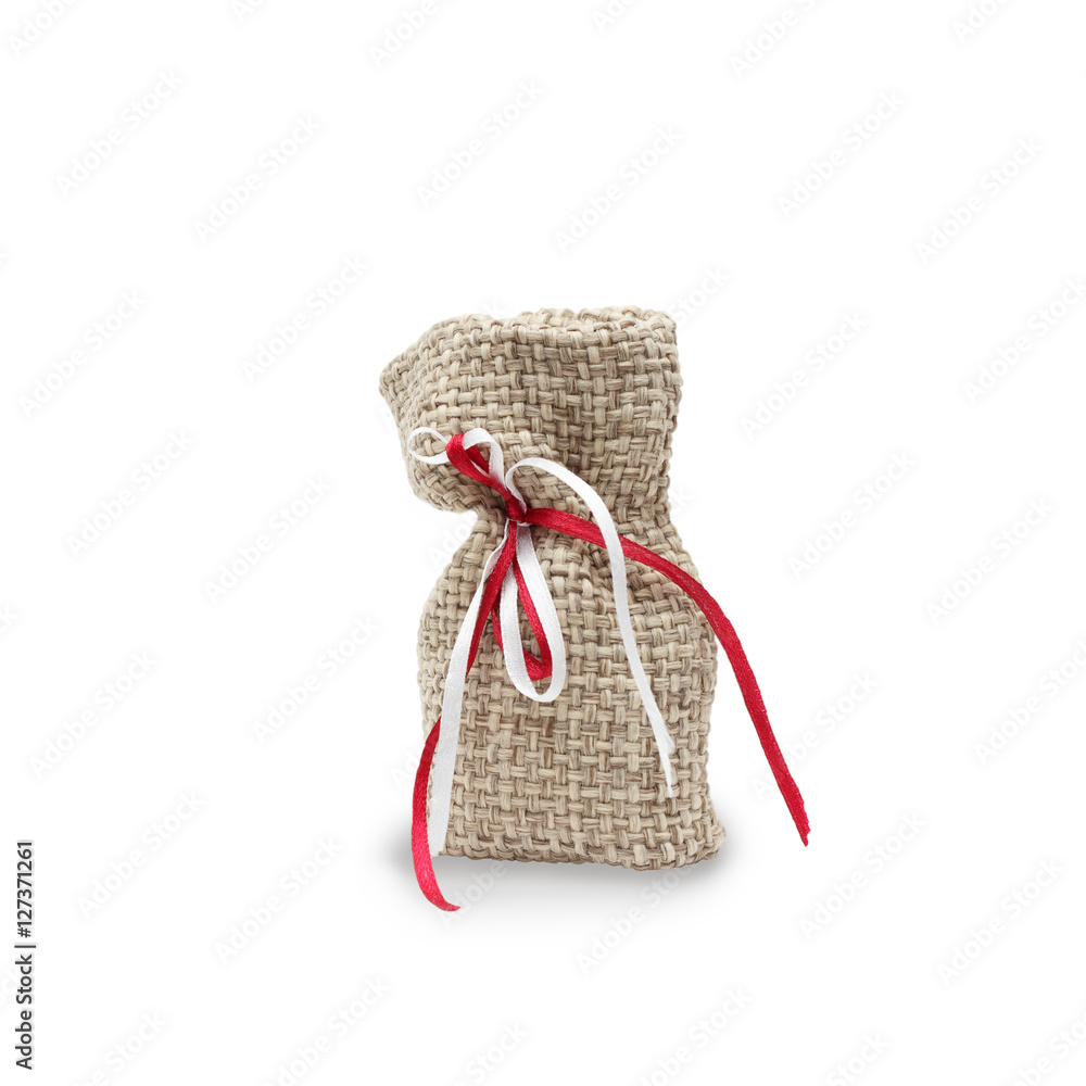 closeup small handmade sack of linen rough texture isolated on white