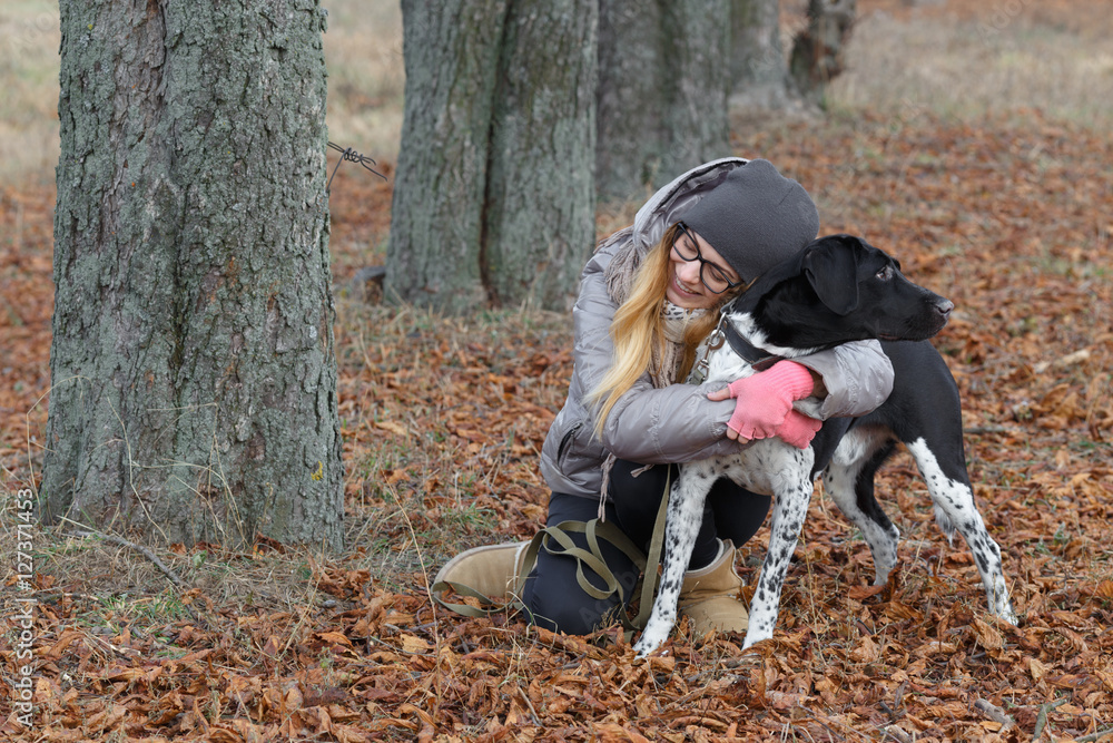 girl with a dog for a walk in the autumn girl with a dog for a walk in the autumn