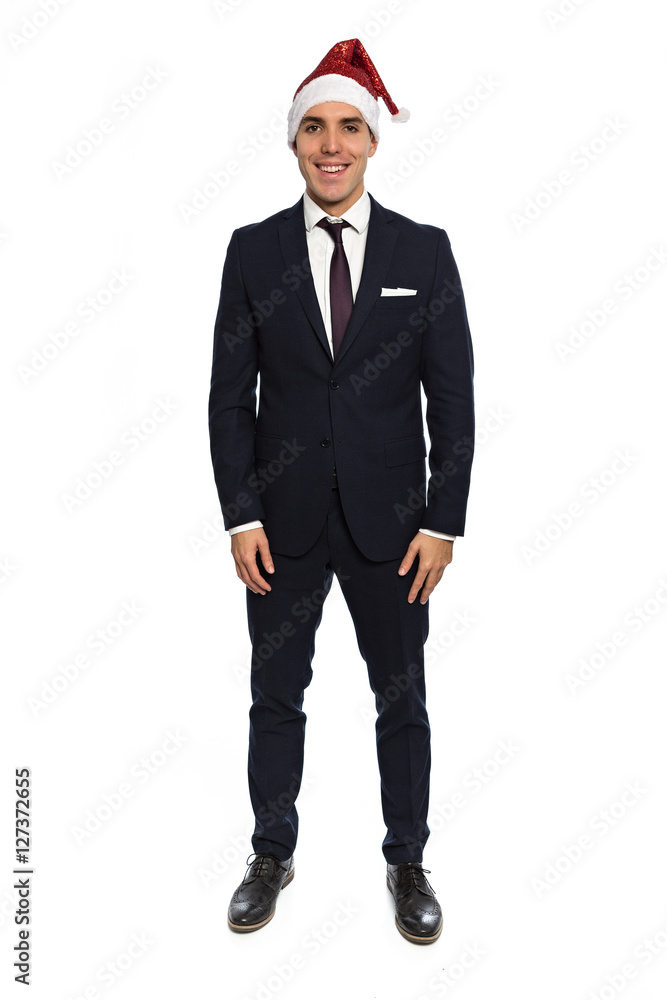 handsome man in a suit with christmas hat handsome man in a suit with christmas hat