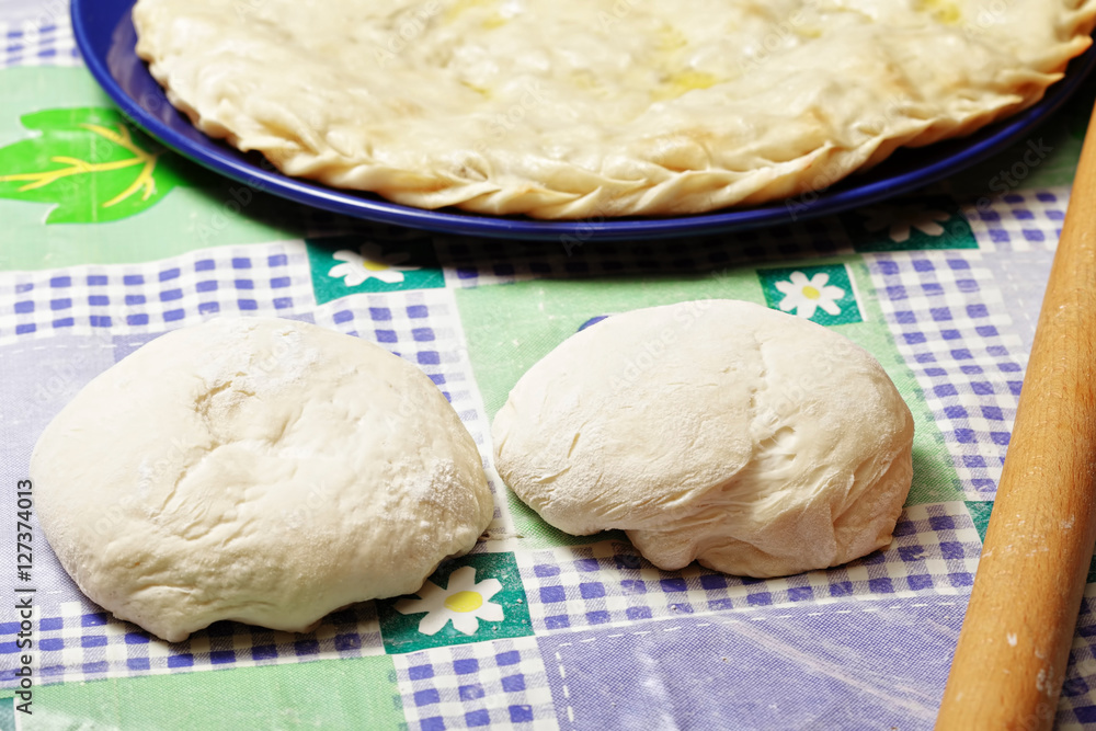 Two pieces of dough and pie Two pieces of dough and pie