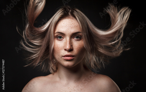 cinematic portrait of girl in dark studio