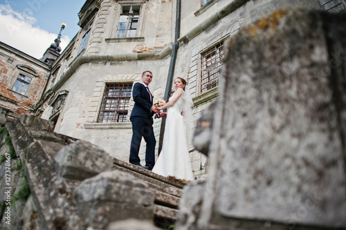 Wedding couple background old vintage castle. Happy newlyweds at © AS Photo Family