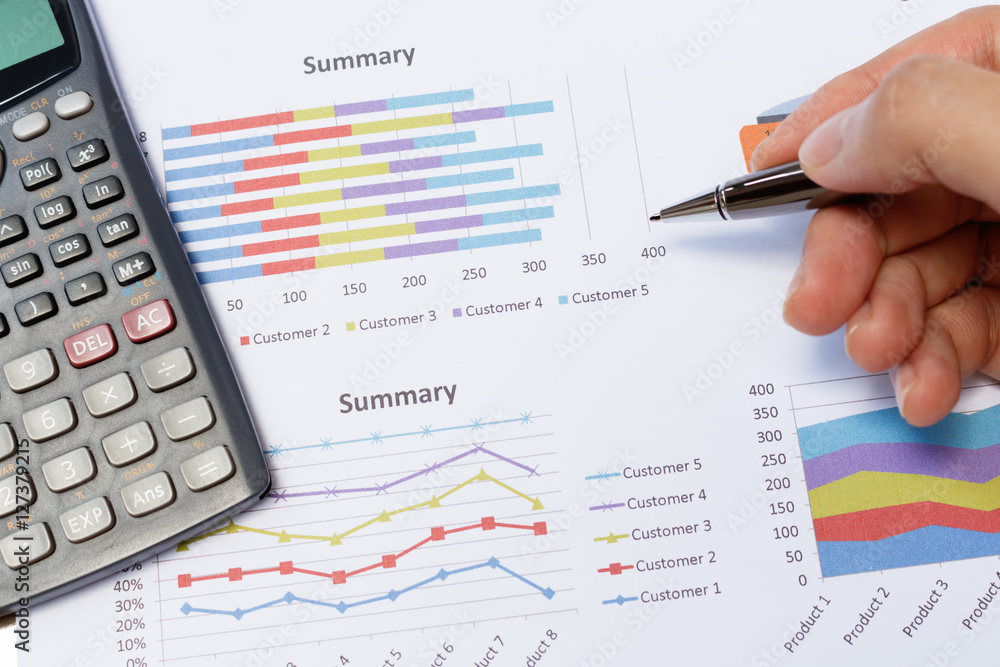 Business meeting, man's hands pointing on charts Business meeting, man's hands pointing on charts