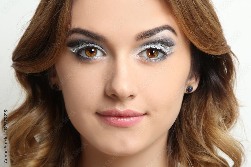 Portrait of a beautiful girl on a white background Portrait of a beautiful girl on a white background