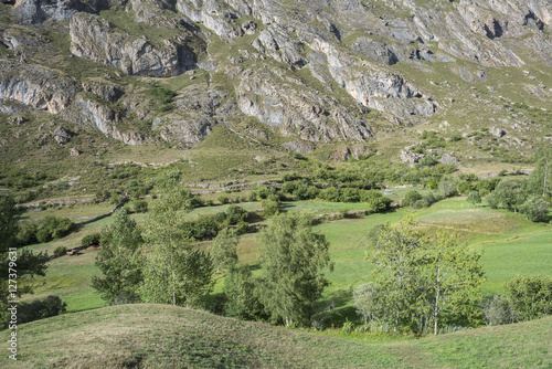 Hay meadows in Valle del Lago, one of fifteen parishes in Somiedo, a municipality located in the central area of the Cantabrian Mountains, Principality of Asturias, Spain photo