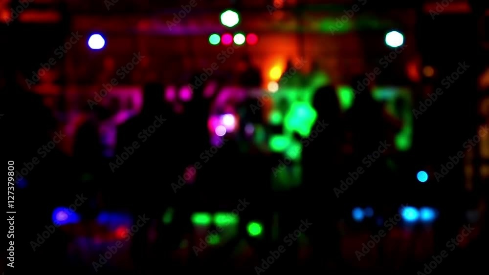 People dancing rock-n-roll at night club, concept blured out of focus silhouette, background live music Elvis Presley - Blue Suede Shoes People dancing rock-n-roll at night club, concept blured out of focus silhouette, background live music Elvis Presley - Blue Suede Shoes
