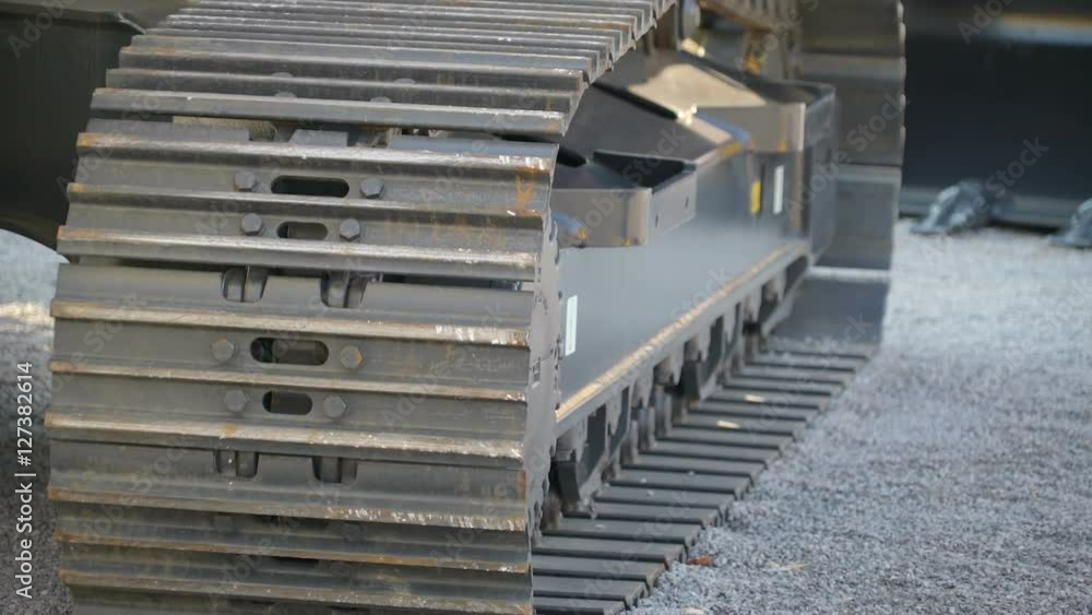 The big tire of an excavator used in construction the flat tire from the big equipment in Ireland The big tire of an excavator used in construction the flat tire from the big equipment in Ireland