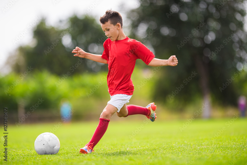 Boy Shooting at Goal