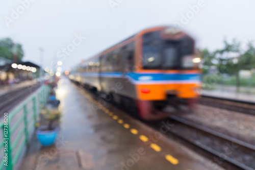 Blur Backbrounf of Vintage Train Passing Rural Railway Station