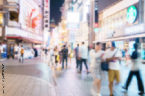 Blurred image of crowded people shopping © littlestocker