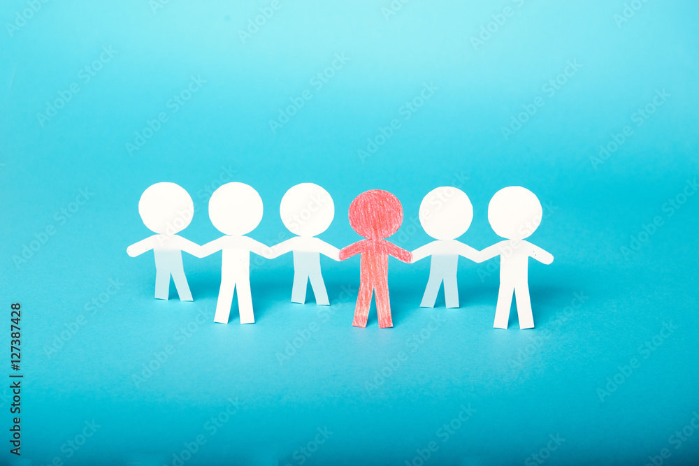 A group of red and white paper people A group of red and white paper people