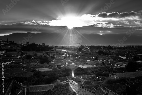 Top View of traditional roof with sunrise and dramatic effects at The Old Town of Lijiang is a UNESCO World Heritage Site located in Lijiang City, Yunnan, China.
