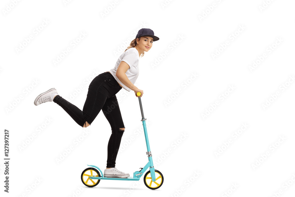 Woman riding a scooter Woman riding a scooter