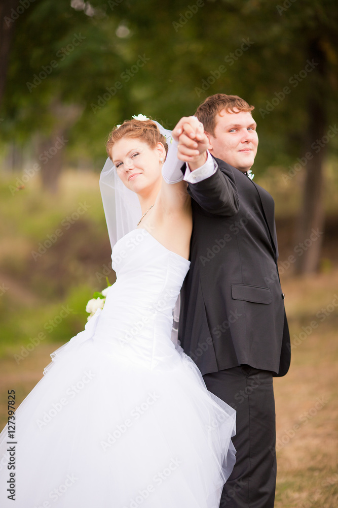 Loving wedding couple outdoor. Loving wedding couple outdoor.