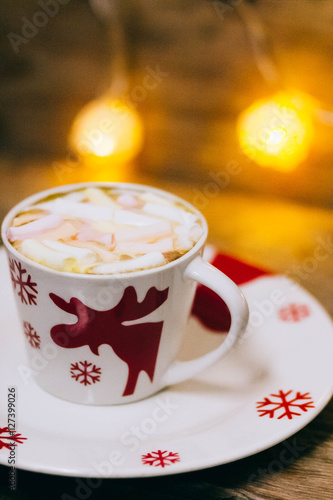 Cup of hot Chocolate drink with Marshmallows and cinnamon on dark wooden background. Winter time. Holiday concept  Selective focus